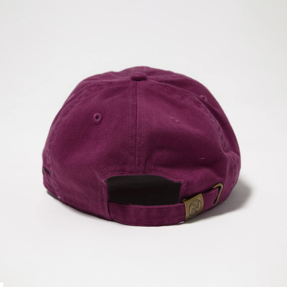 Brim detail of the J.Press Aaron Chang Cotton Twill Baseball Cap Purple showing curved visor shape and stitching lines for Clothier & Sons.