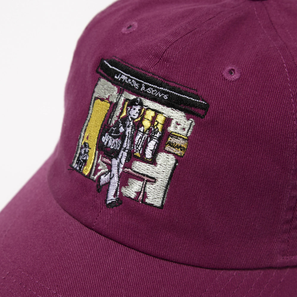 Top view of the J.Press Aaron Chang Cotton Twill Baseball Cap Purple showing panel construction, ventilation eyelets, and crown shape for Clothier & Sons.