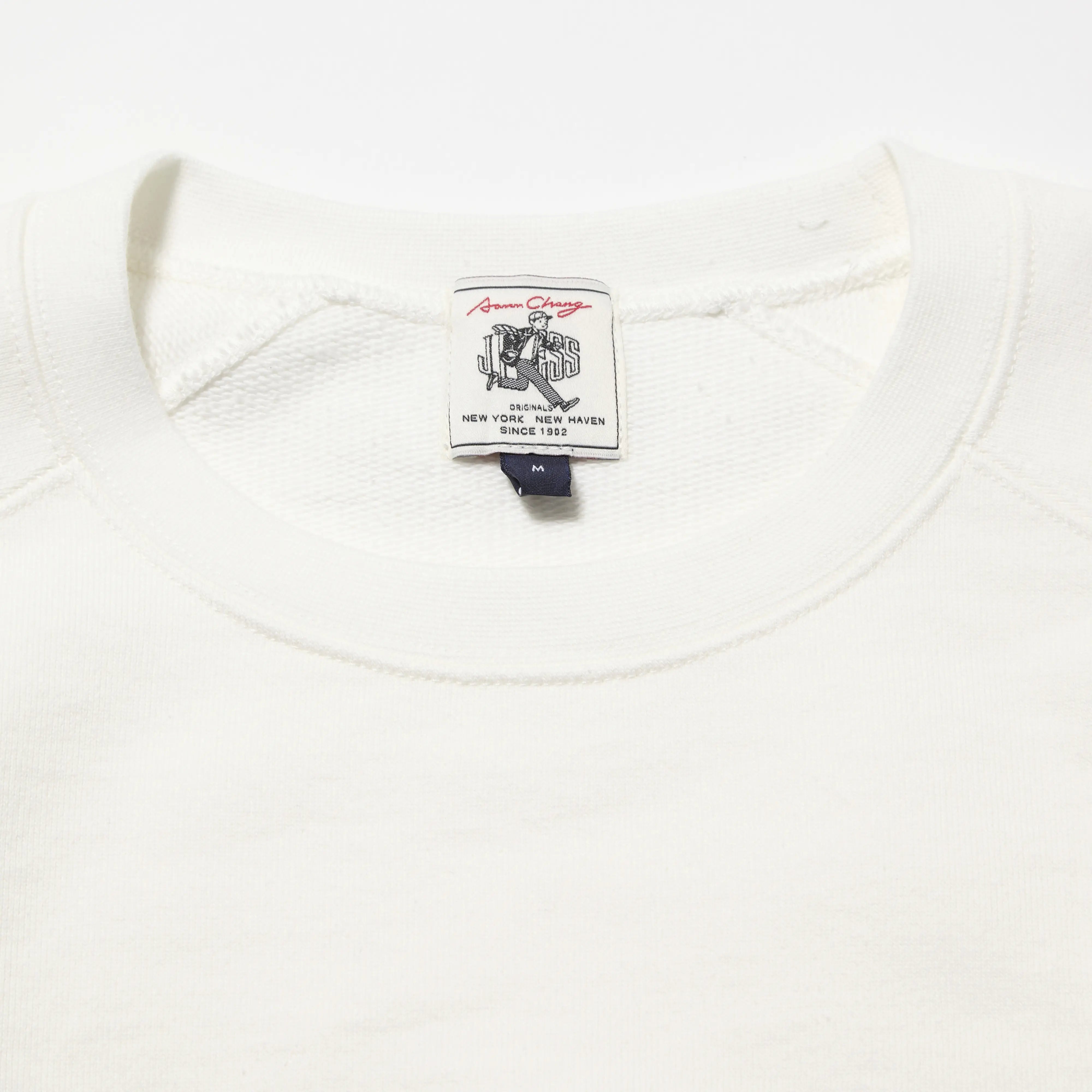 Cuff detail of the J.Press Aaron Illust-Sweat Graphic Sweatshirt White showing ribbed cuff construction and soft fabric finish for Clothier & Sons.