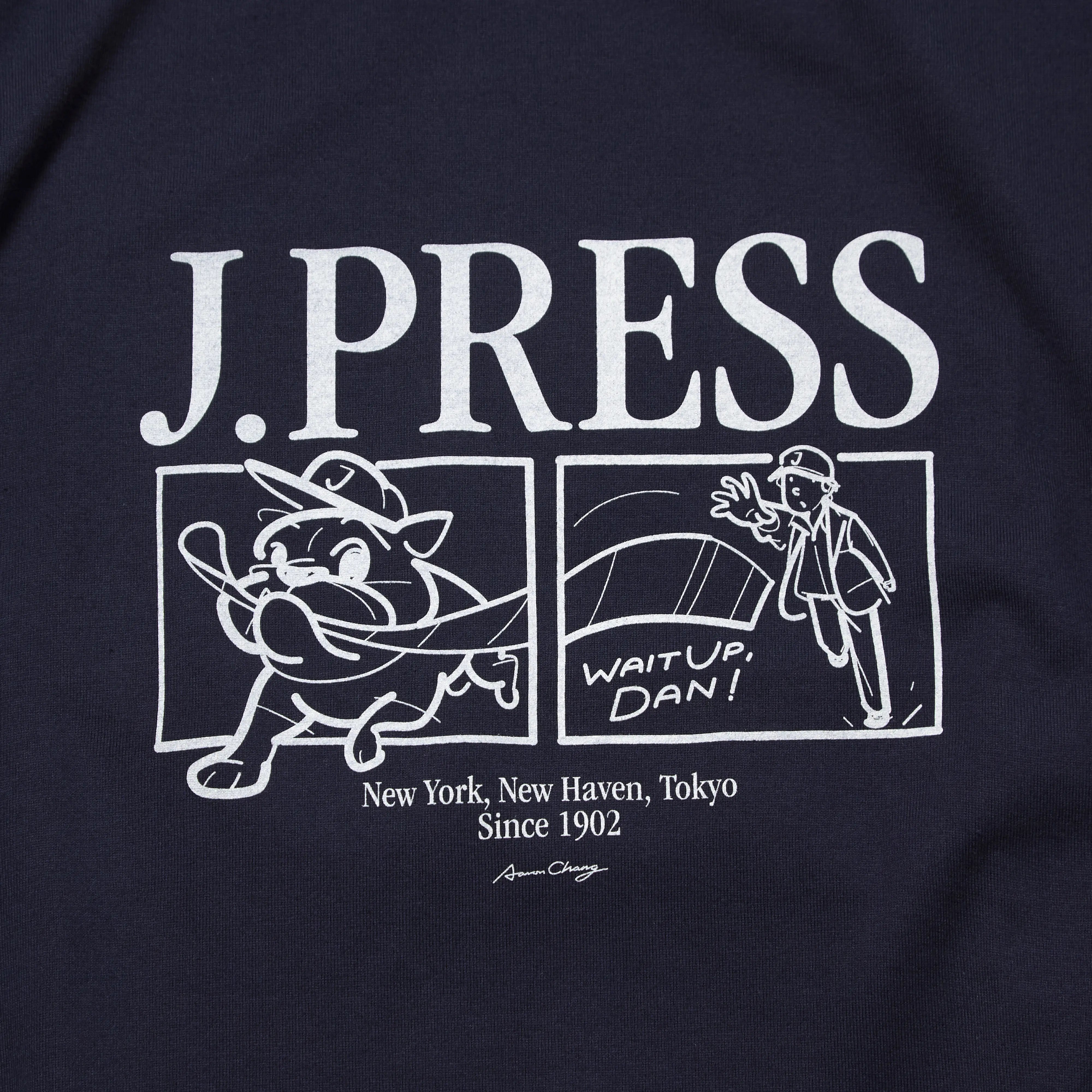 Graphic detail of the J.Press Aaron Illust T-shirt Graphic Navy showing printed illustration and design placement for Clothier & Sons.
