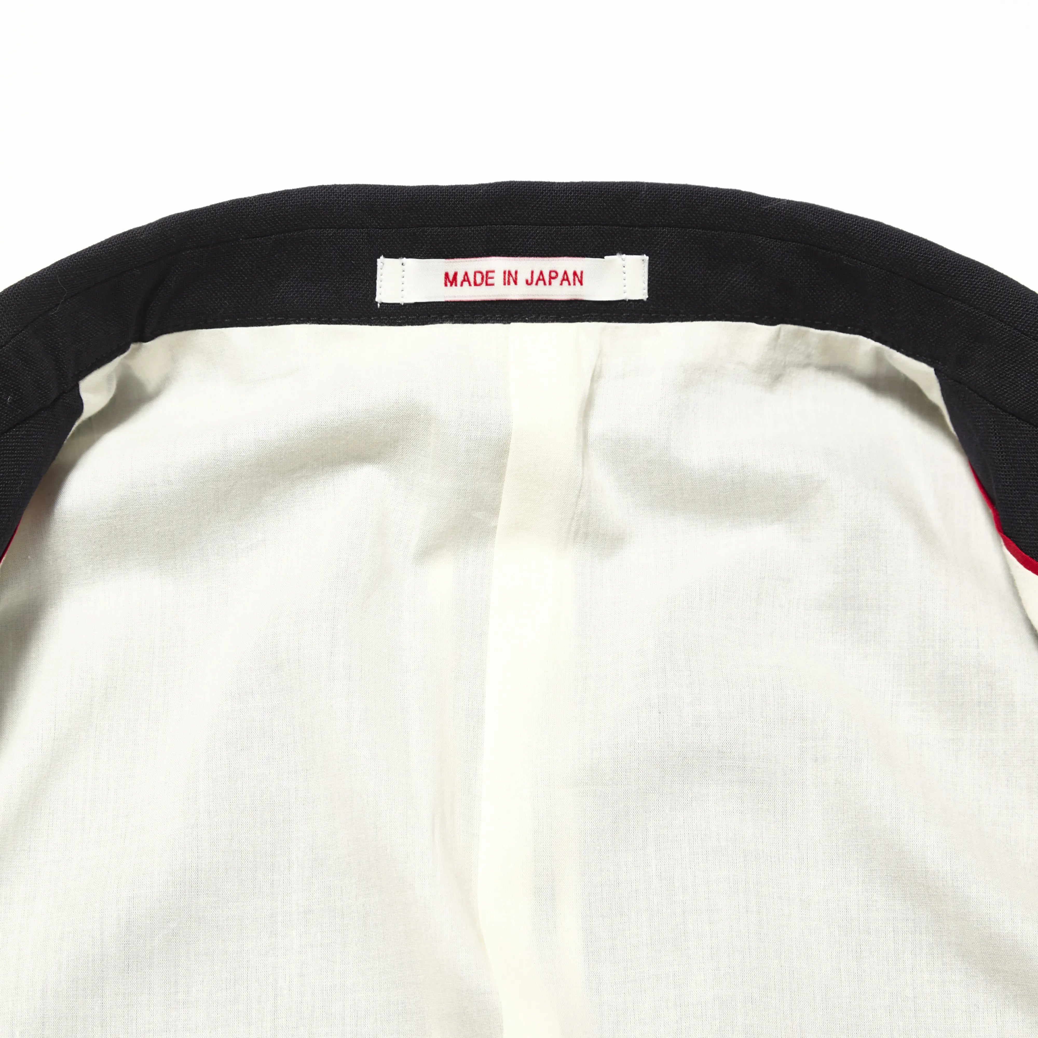 Inside label of the J.Press High Twist Hopsack New Jacket 6B Blazer Navy showing brand identification and size information for Clothier & Sons.
