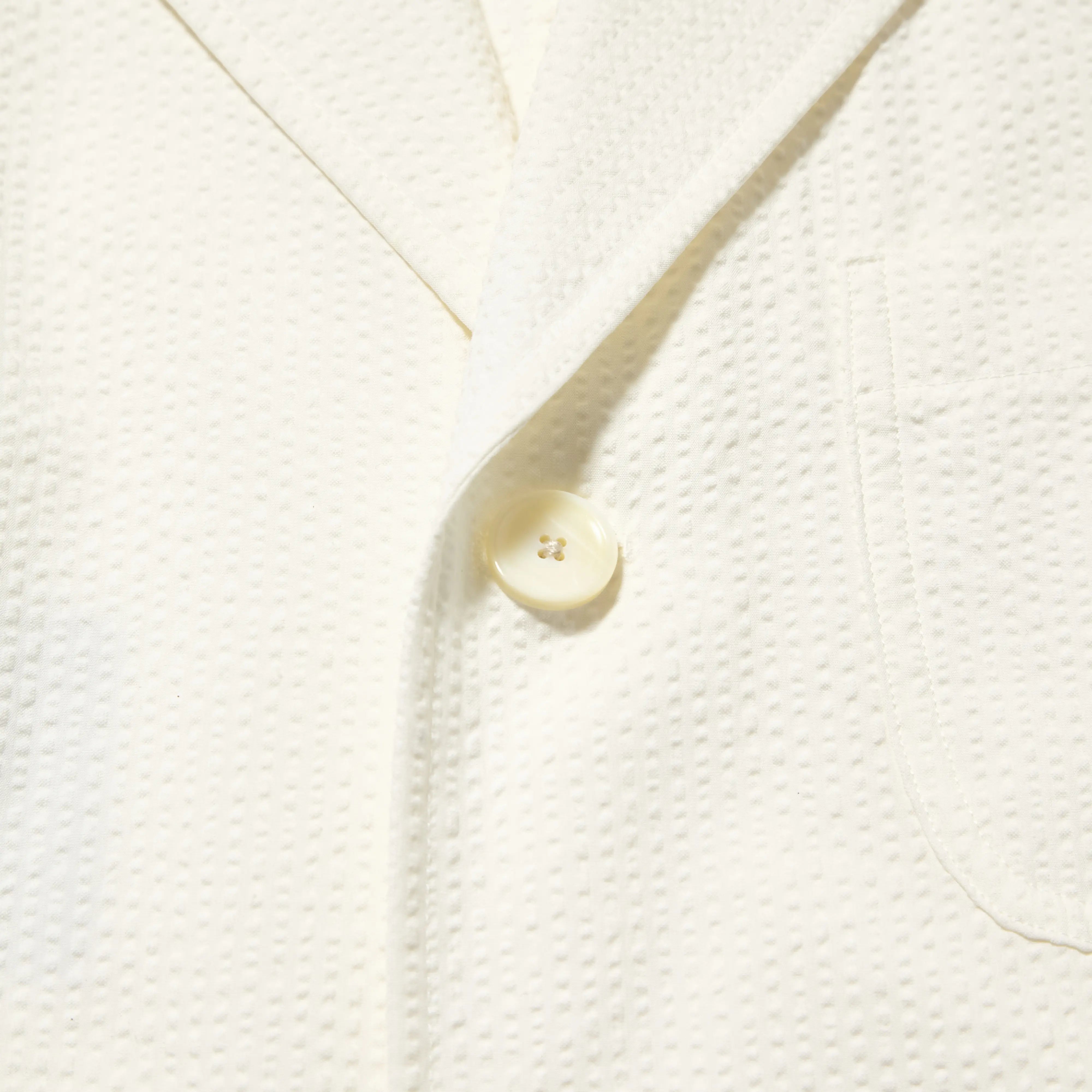 Fabric detail of the J.Press Silk Seersucker 3B Sack Jacket White revealing textured seersucker weave and breathable summer fabric for Clothier & Sons.

