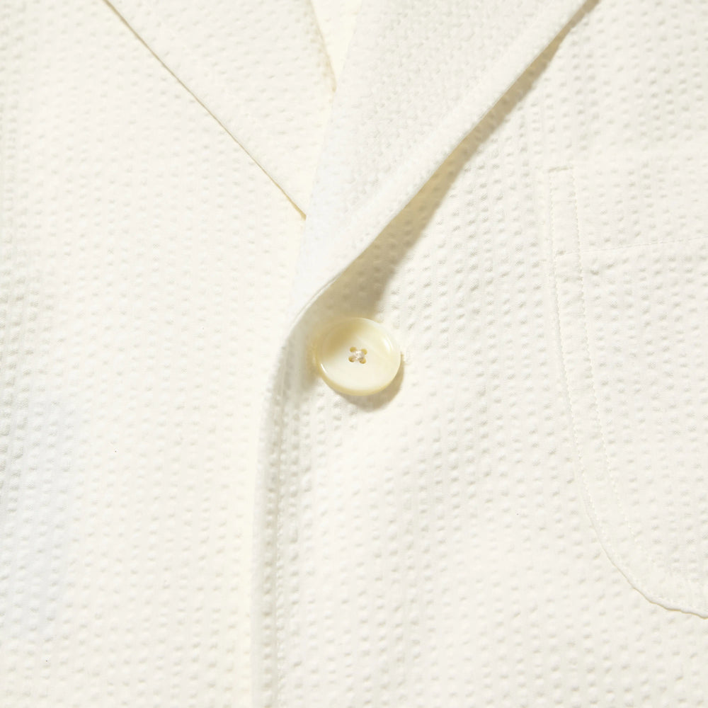 Fabric detail of the J.Press Silk Seersucker 3B Sack Jacket White revealing textured seersucker weave and breathable summer fabric for Clothier & Sons.
