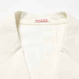 Lapel detail of the J.Press Silk Seersucker 3B Sack Jacket White showing notch lapel shape and soft tailoring for Clothier & Sons.
