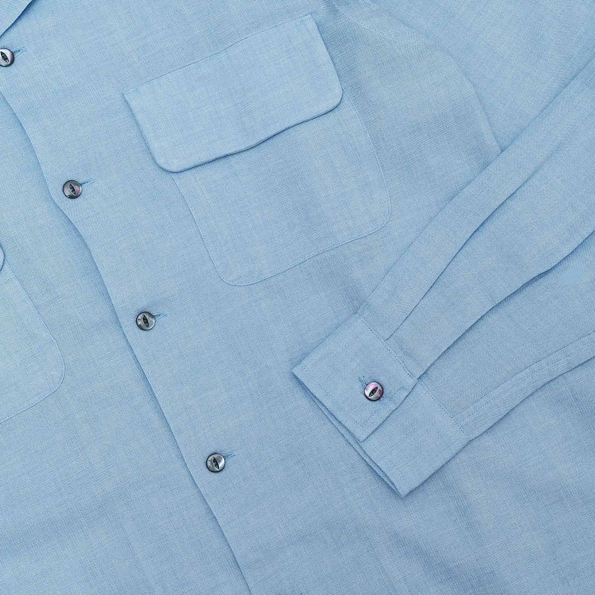 Button detail of the Knickerbocker Merino Hudson Shirt Sky Blue highlighting button material, stitching accuracy, and understated detailing for Clothier & Sons.