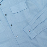 Button detail of the Knickerbocker Merino Hudson Shirt Sky Blue highlighting button material, stitching accuracy, and understated detailing for Clothier & Sons.