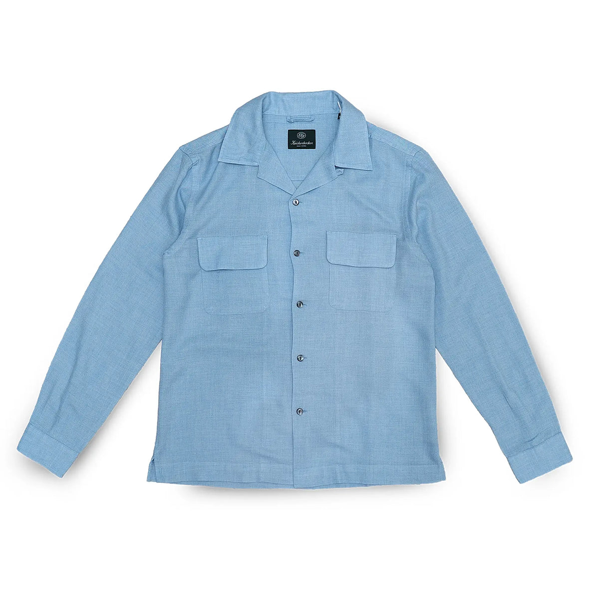 Front view of the Knickerbocker Merino Hudson Shirt Sky Blue showing the classic button-down shirt silhouette, soft sky blue tone, and clean minimalist design for Clothier & Sons.