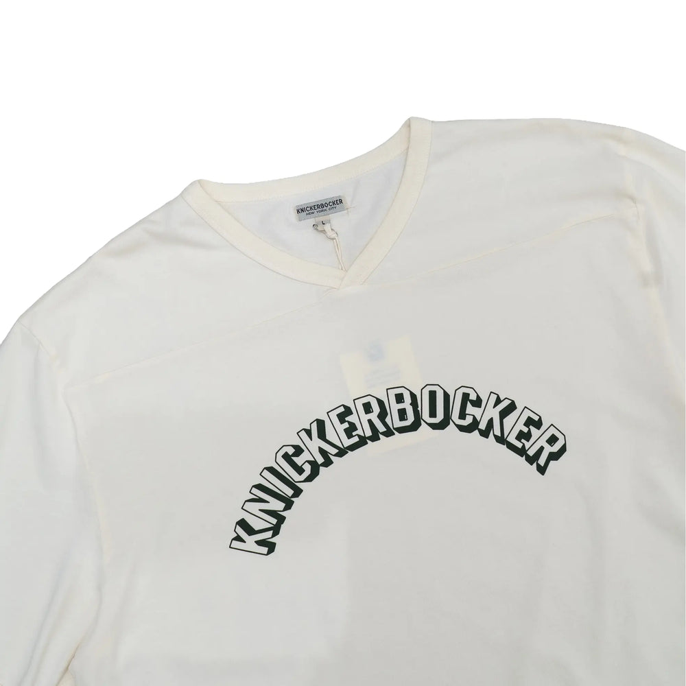 Collar detail of the Knickerbocker Track Tee Milk showing ribbed neckline construction, stitching precision, and refined casual finishing for Clothier & Sons.