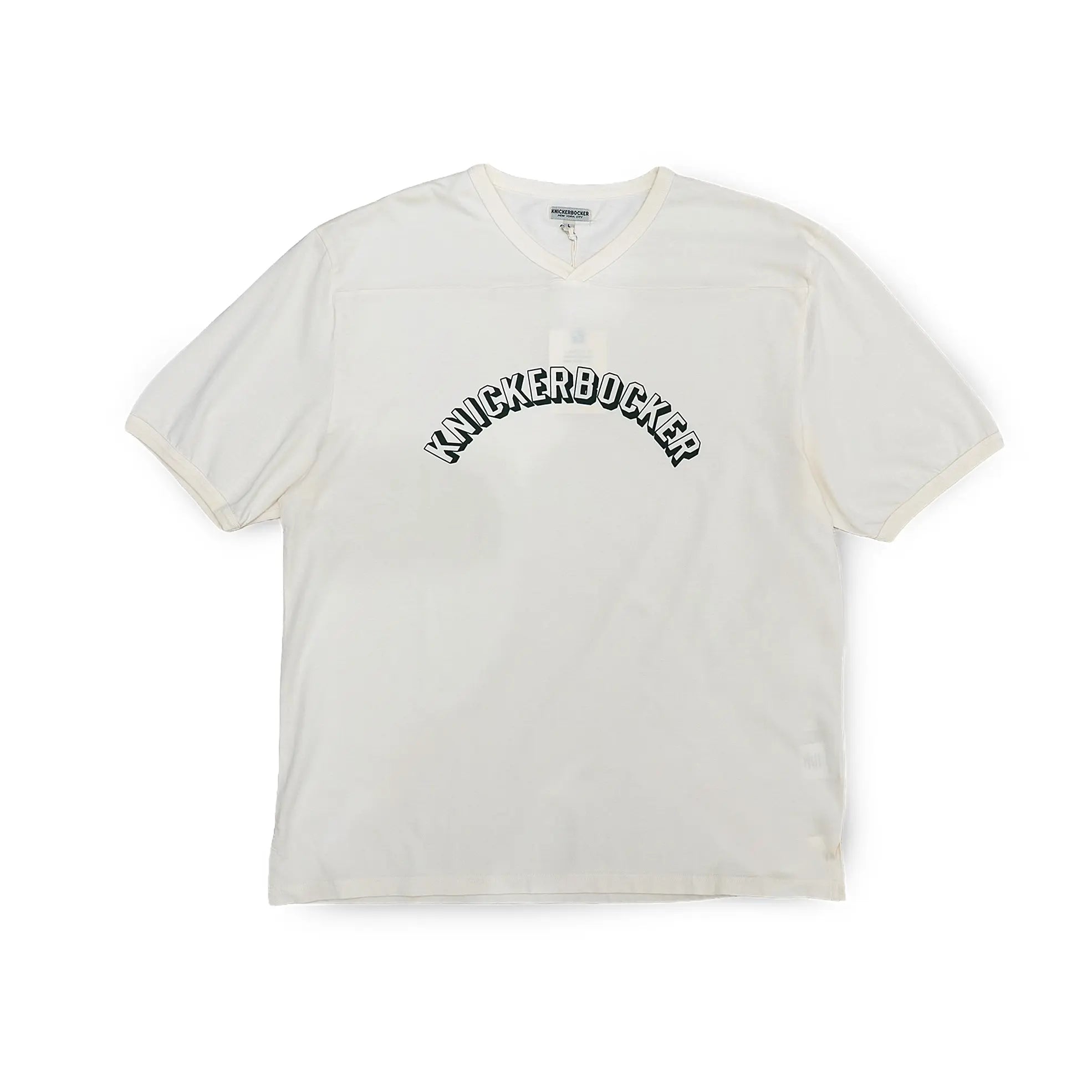 Front view of the Knickerbocker Track Tee Milk showing the classic track tee silhouette, soft milk tone, and clean minimalist design for Clothier & Sons.
