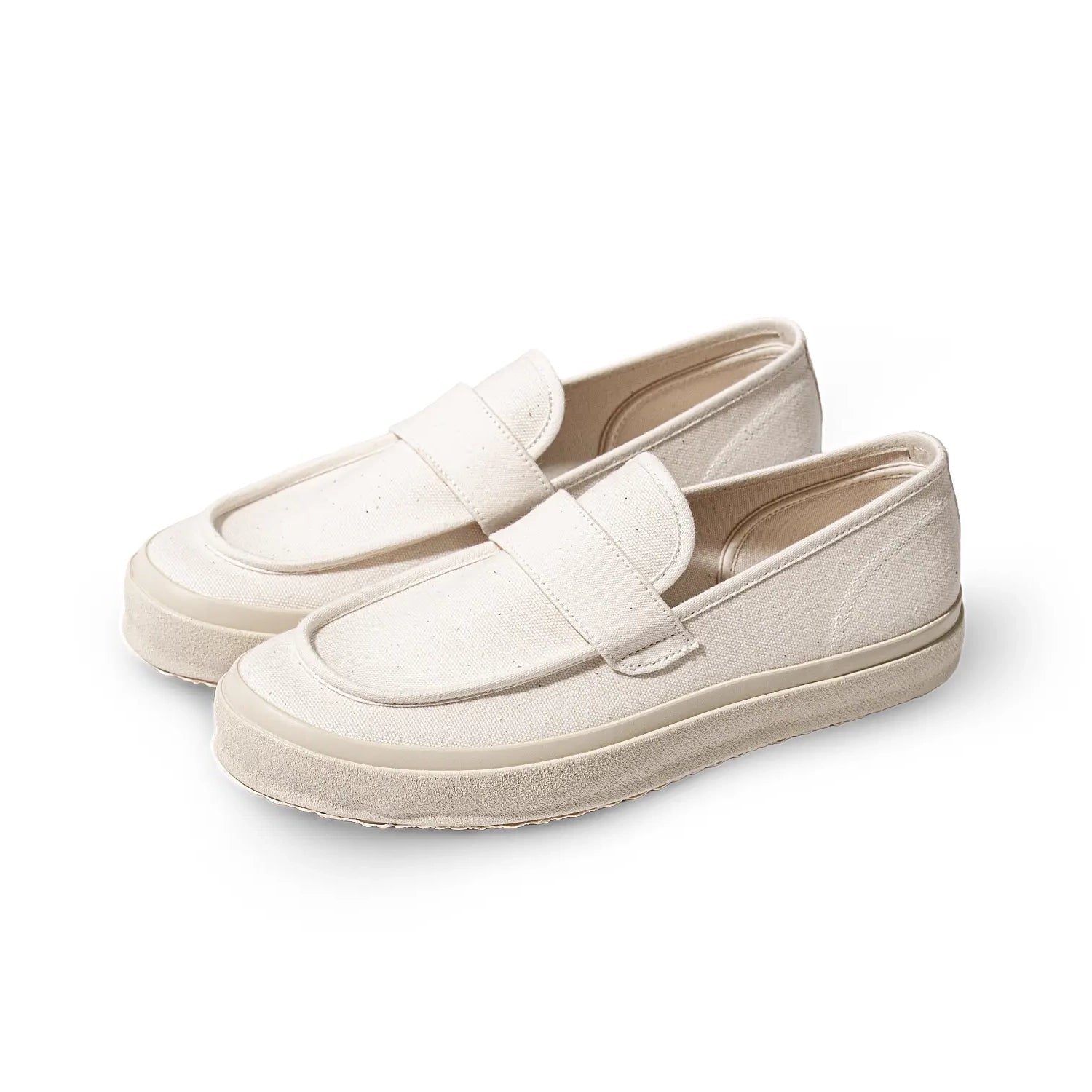Front three-quarter view of the Moonstar Loafy Natural showing the classic loafer shape, natural tone canvas, and minimalist construction for Clothier & Sons.