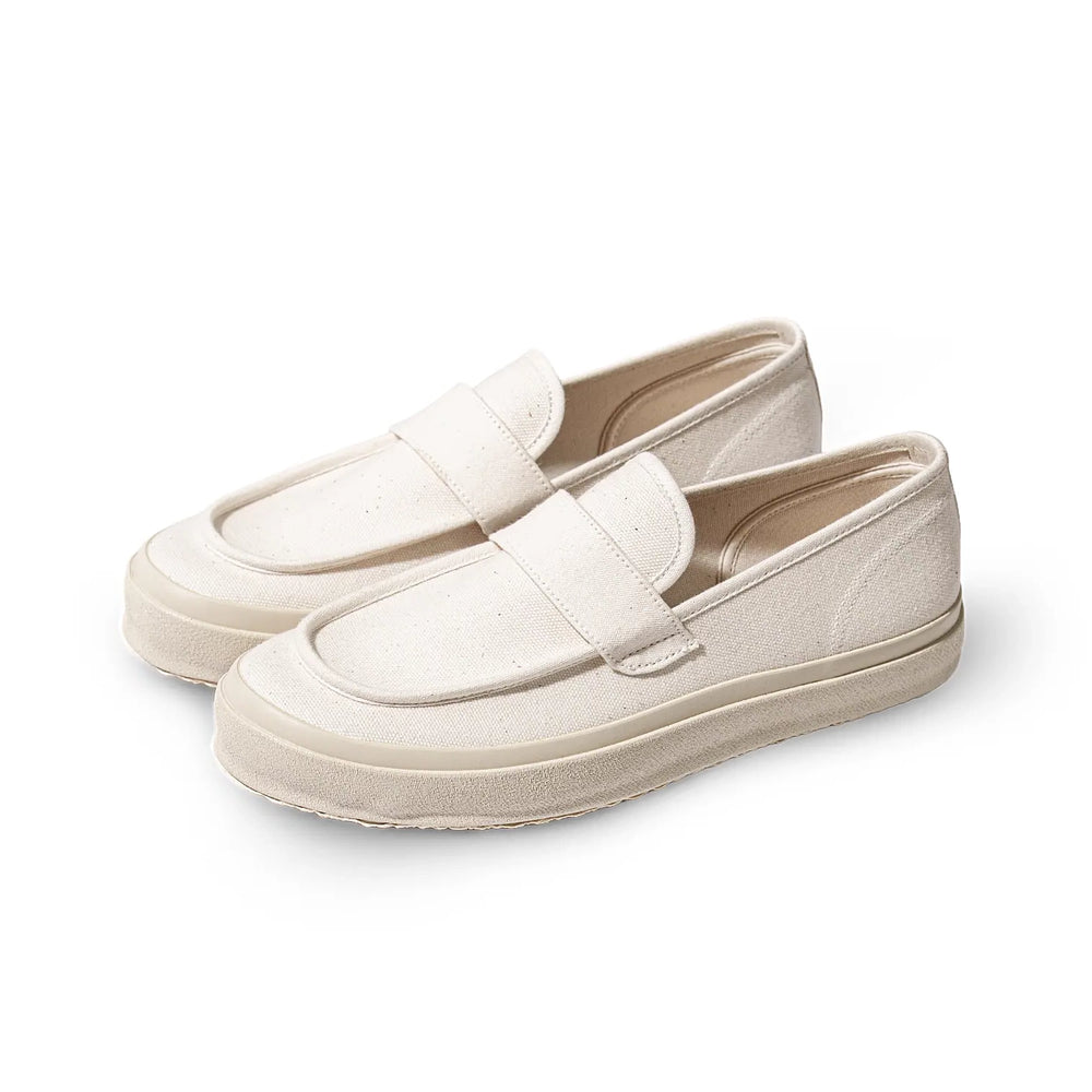 Front three-quarter view of the Moonstar Loafy Natural showing the classic loafer shape, natural tone canvas, and minimalist construction for Clothier & Sons.