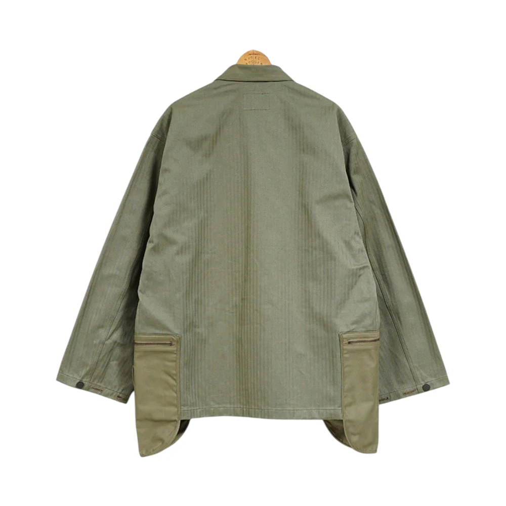 Back view of the Nigel Cabourn Fatigue Jacket Modify Green highlighting the clean back panel, structure, and classic military proportions for Clothier & Sons.