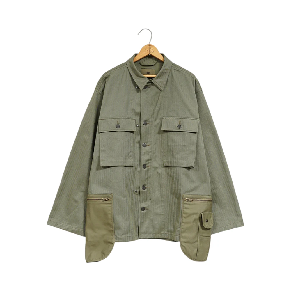 Front view of the Nigel Cabourn Fatigue Jacket Modify Green showing its military-inspired silhouette, patch pockets, and rugged construction for Clothier & Sons.