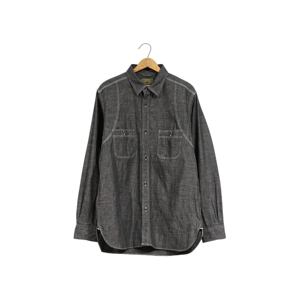 Front view of the Nigel Cabourn New Medical Shirt Black showing its vintage medical-inspired design, relaxed silhouette, and clean black fabric for Clothier & Sons.