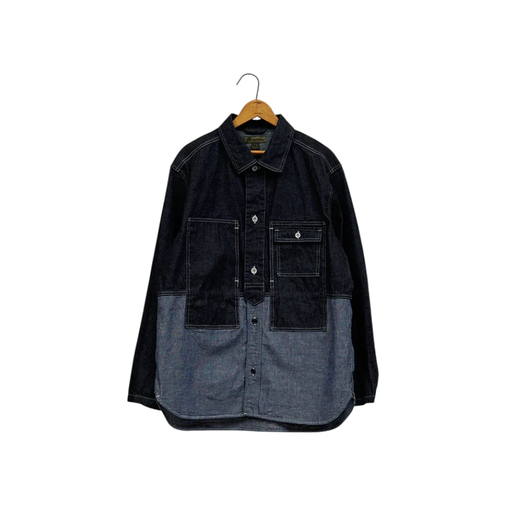 Front view of the Nigel Cabourn Utility Shirt Type 2 10oz Denim Indigo showing its workwear-inspired design, chest pockets, and indigo denim texture for Clothier & Sons.