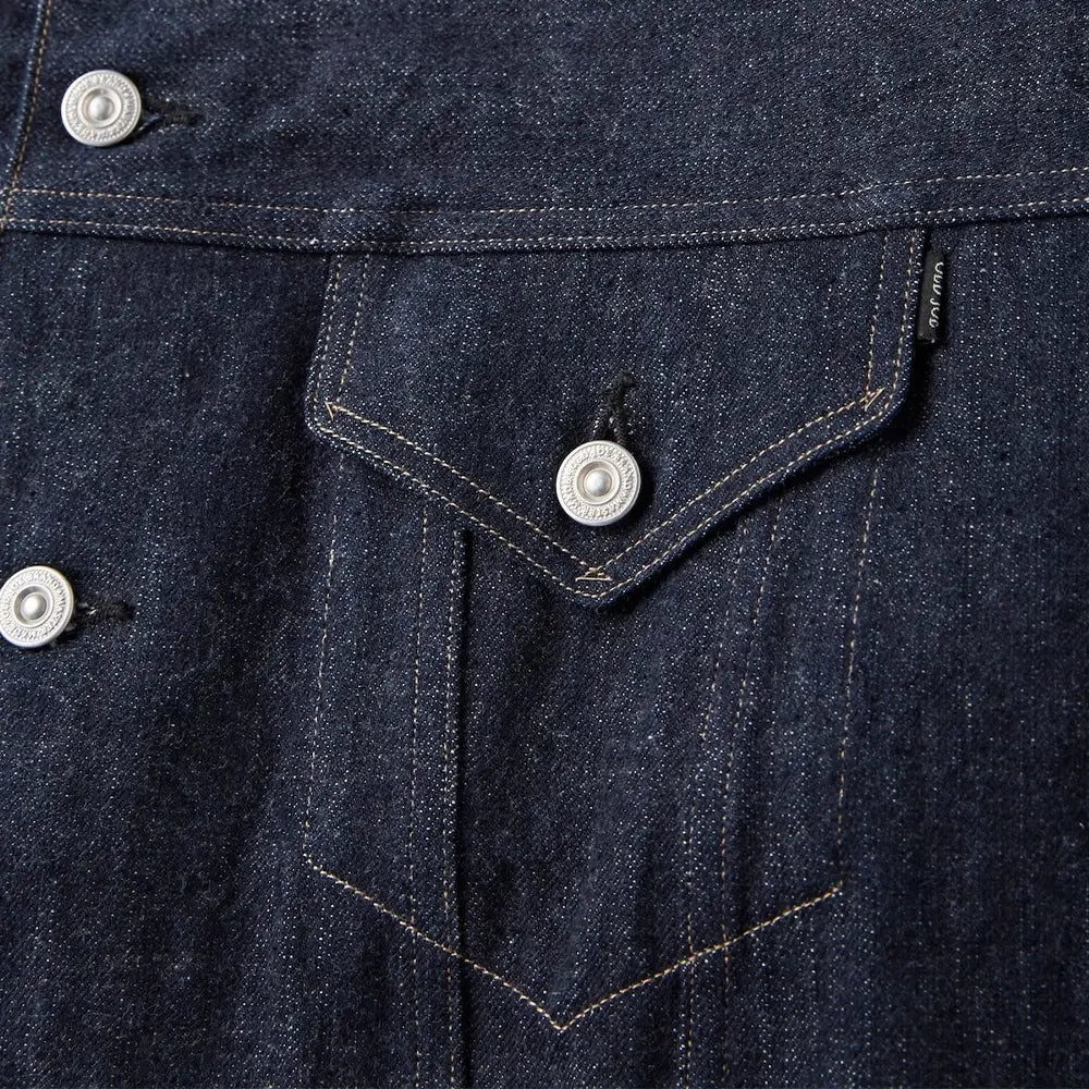 Pocket detail of the Old Joe Curved Flap Jean Jacket Indigo showing curved flap pocket design, stitching, and functional workwear-inspired construction for Clothier & Sons.