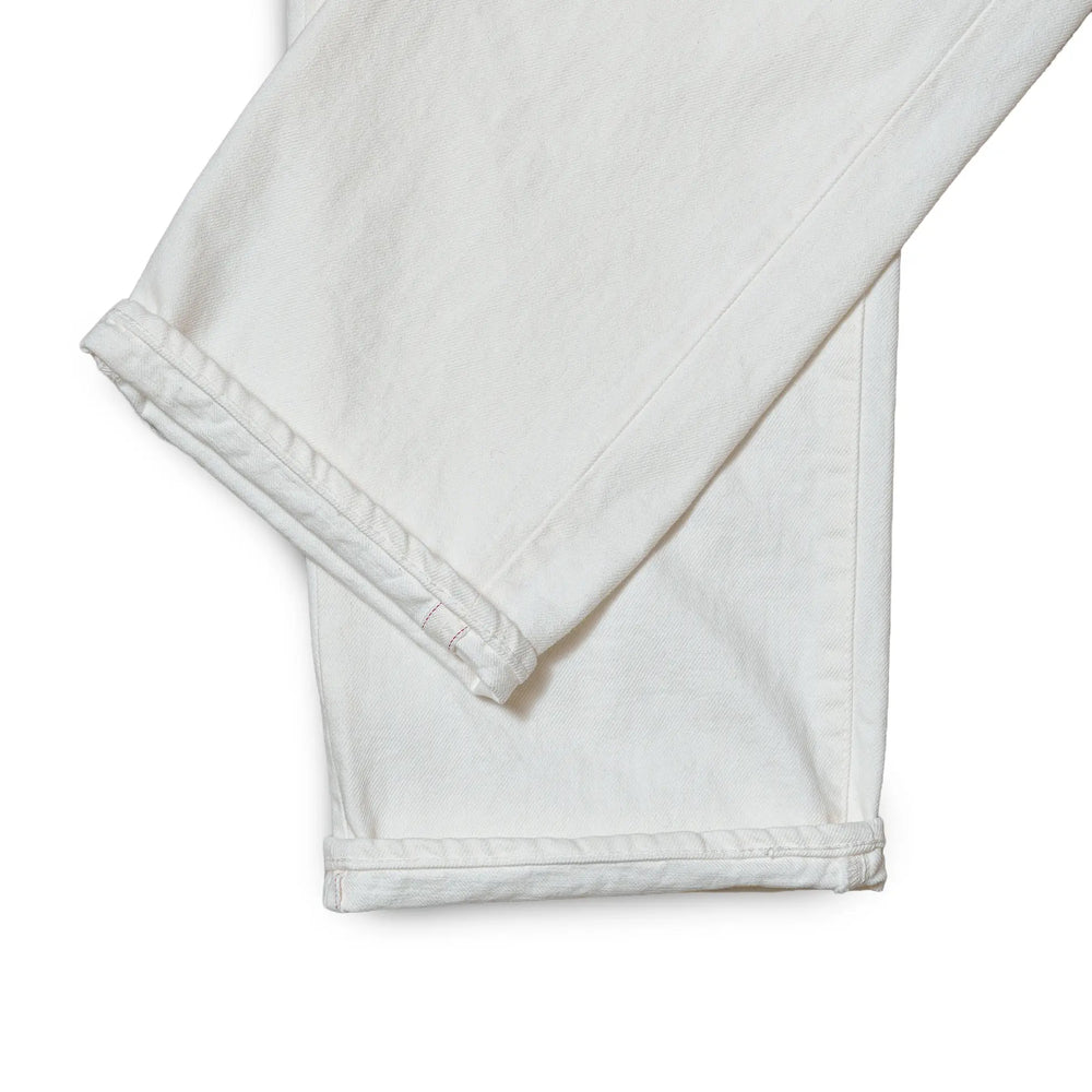 Fabric detail of the Omnigod Clothier & Sons Selvedge White Jeans revealing selvedge denim texture, tight weave structure, and bright white coloration for Clothier & Sons.