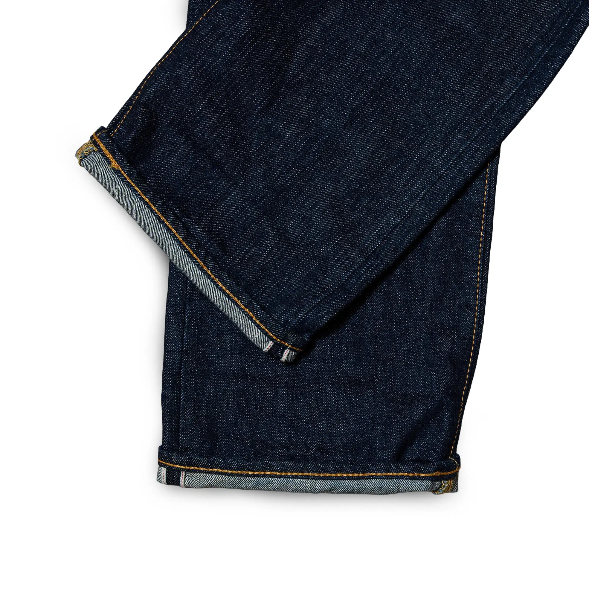 Fabric detail of the Omnigod Clothier & Sons Selvedge One Wash Jeans revealing Japanese selvedge denim texture, one wash surface character, and depth of indigo tone for Clothier & Sons.