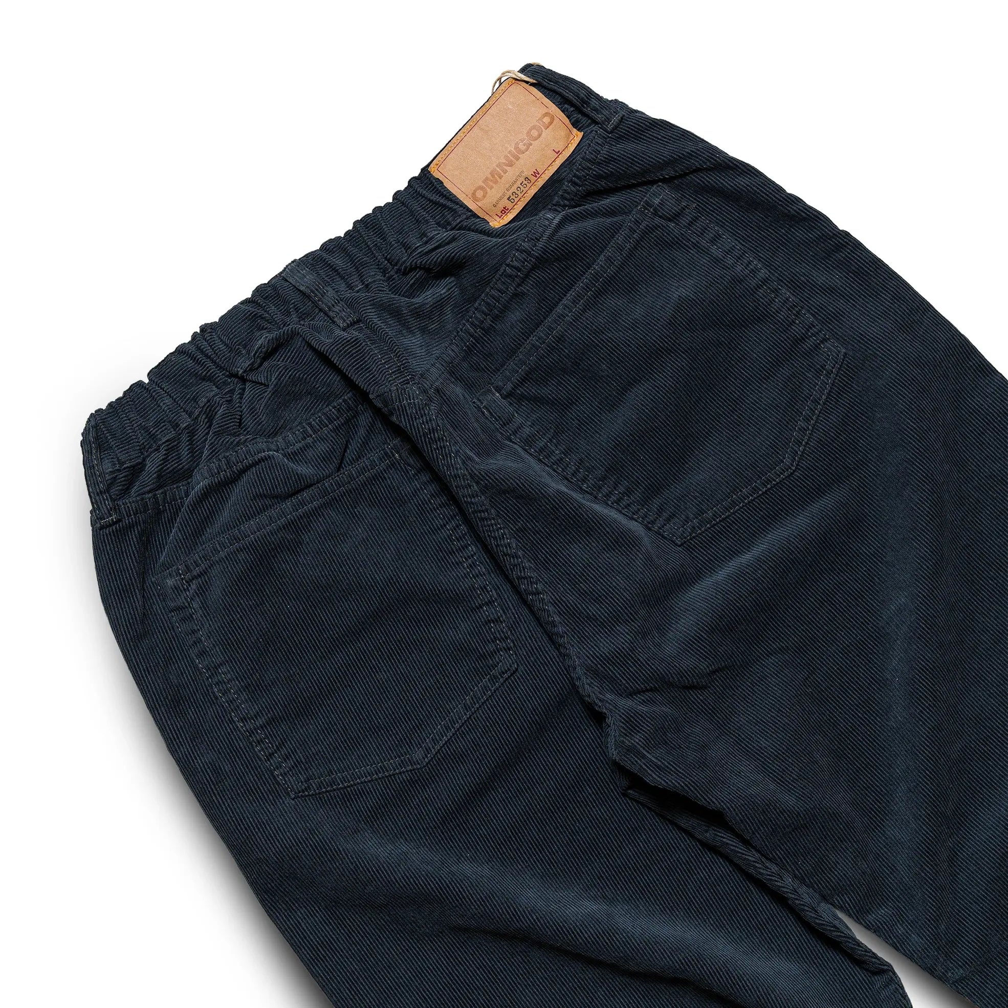 Back view of the Omnigod Men’s 14W Corduroy 5-Piece Easy Loose Jeans Gray highlighting back pocket placement, relaxed fit, and corduroy texture for Clothier & Sons.