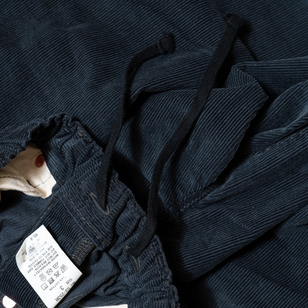 Waist detail of the Omnigod Men’s 14W Corduroy 5-Piece Easy Loose Jeans Gray showing waistband construction, belt loops, and stitching finish for Clothier & Sons.