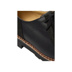 Close-up detail of the Paraboot x Universal Works Michael Smooth Black Velvet highlighting the raw leather texture, suede panel, and collaborative branding for Clothier & Sons.