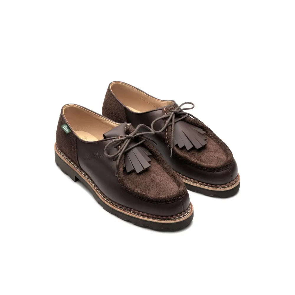 Angled view of the Paraboot x Universal Works Michael Smooth Velours Cafe showcasing the rounded toe shape, dual-texture leather, and removable fringe tab for Clothier & Sons.