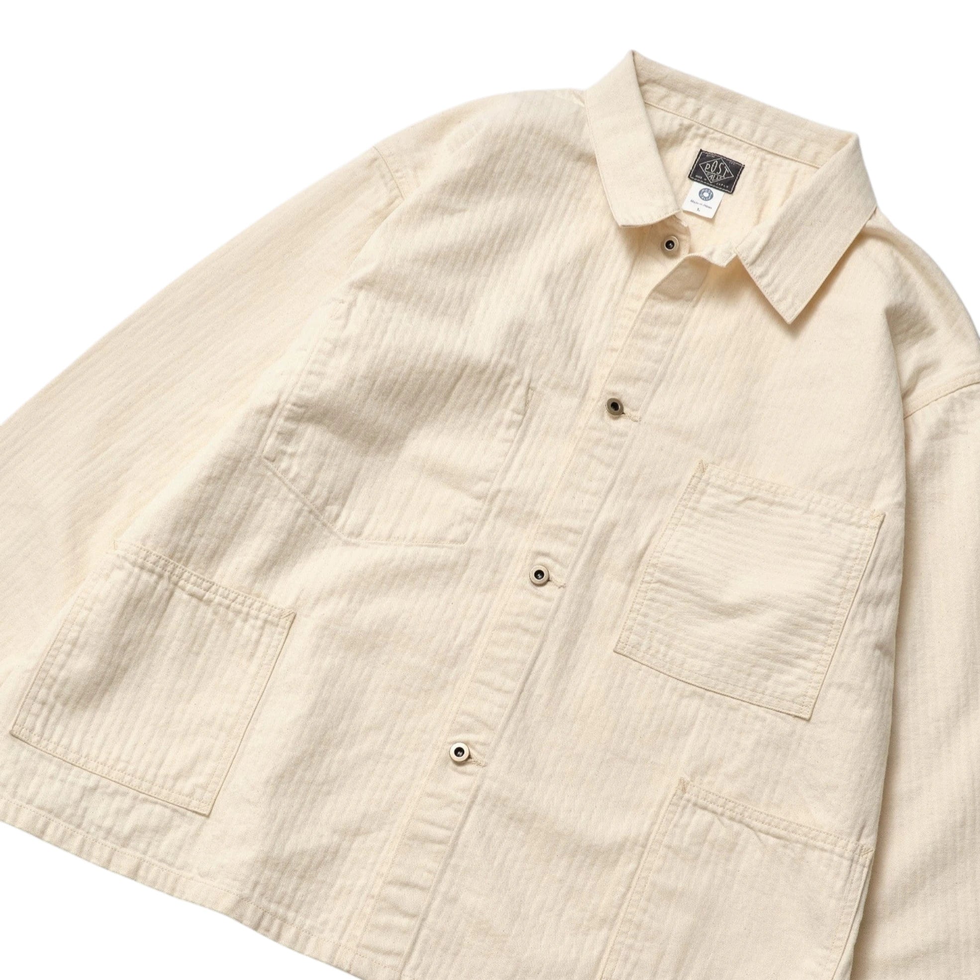 Pocket detail of the Post O’Alls 3114R-MH4 USMC 1930s Utility Jacket Mini HBT Natural highlighting flap pocket construction and reinforced stitching for Clothier & Sons.
