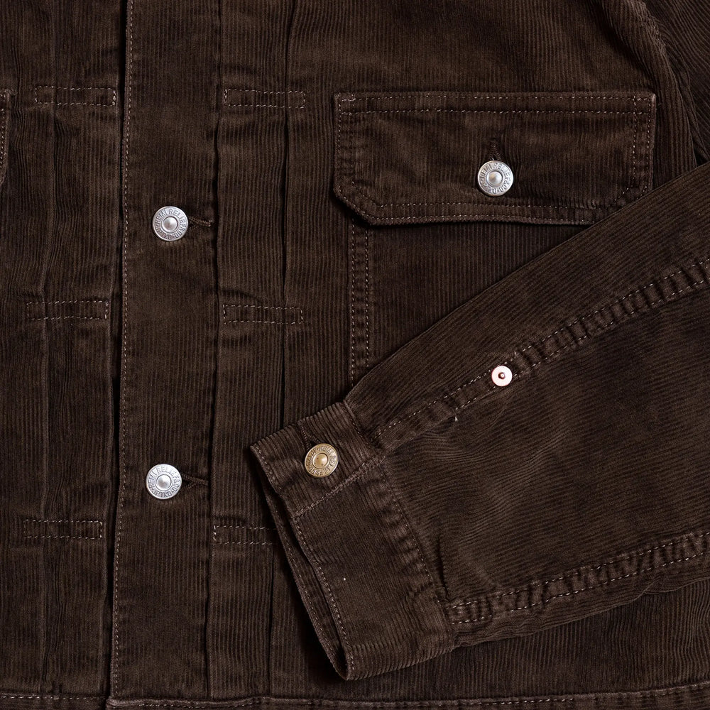 Pocket and stitching detail of the Remi Relief 14W Corduroy 2nd Jacket in Brown highlighting precise construction and workmanship for Clothier & Sons.