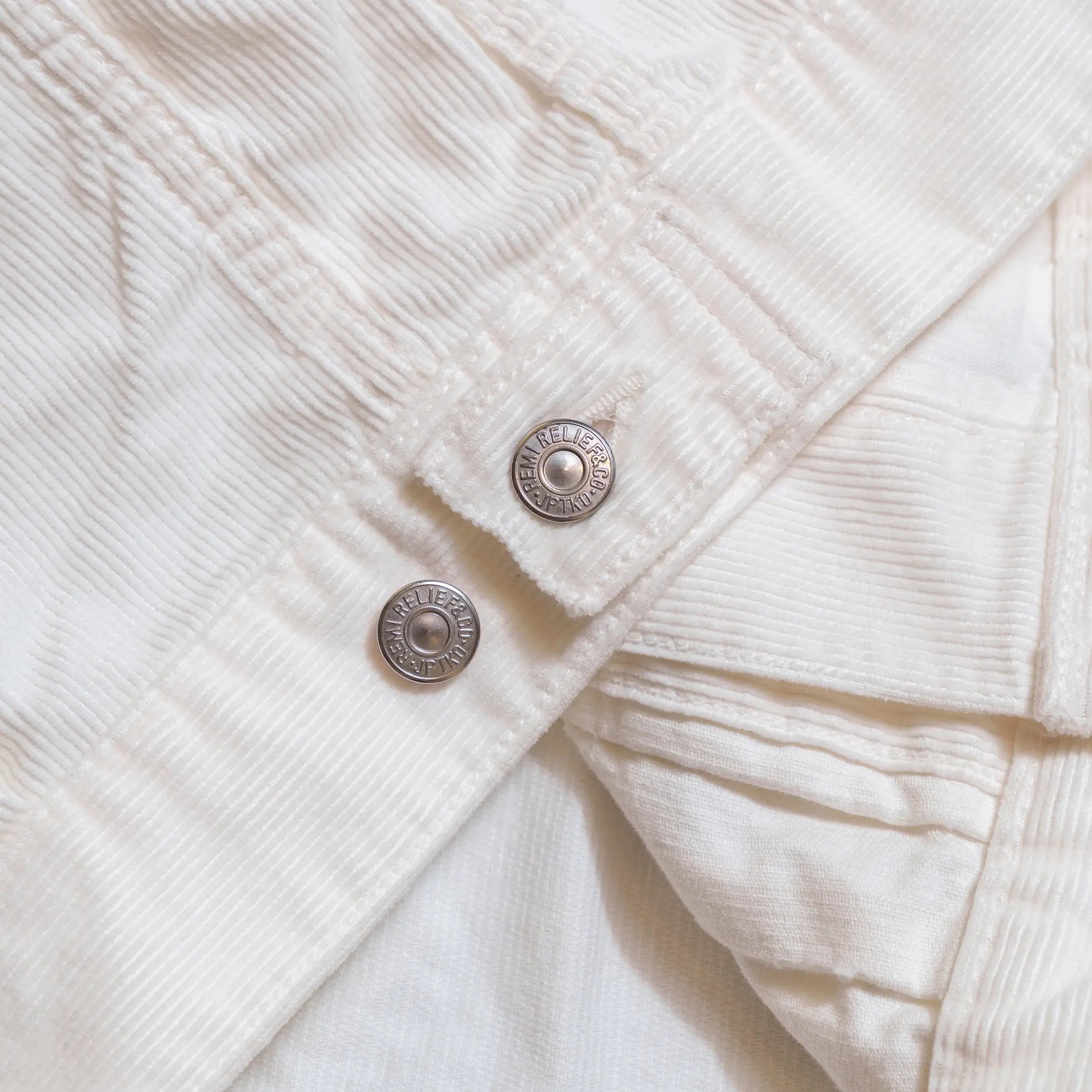 detail of the Remi Relief 14W Corduroy 2nd Jacket in Off White highlighting precise construction and workmanship for Clothier & Sons.