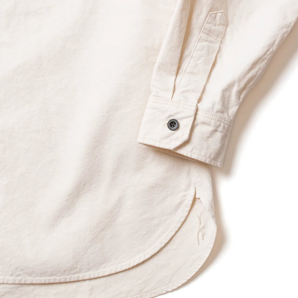 Close-up of 8oz cotton canvas texture on Seuvas 8oz Canvas Flap Work Shirt in natural.