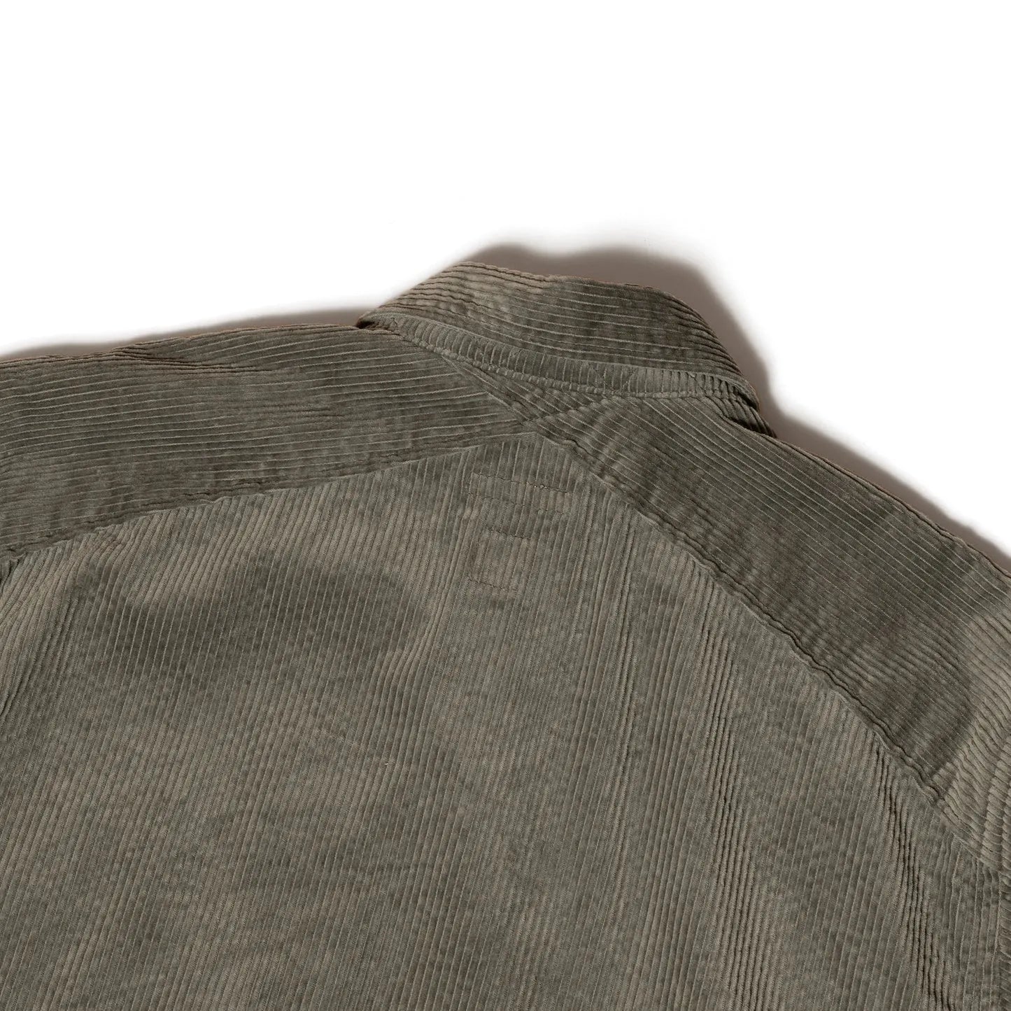 Close-up of cotton corduroy texture on Seuvas Corduroy CPO Shirt in sage.