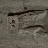 Close-up of buttoned cuff and sleeve seam detail on Seuvas Corduroy CPO Shirt in sage.