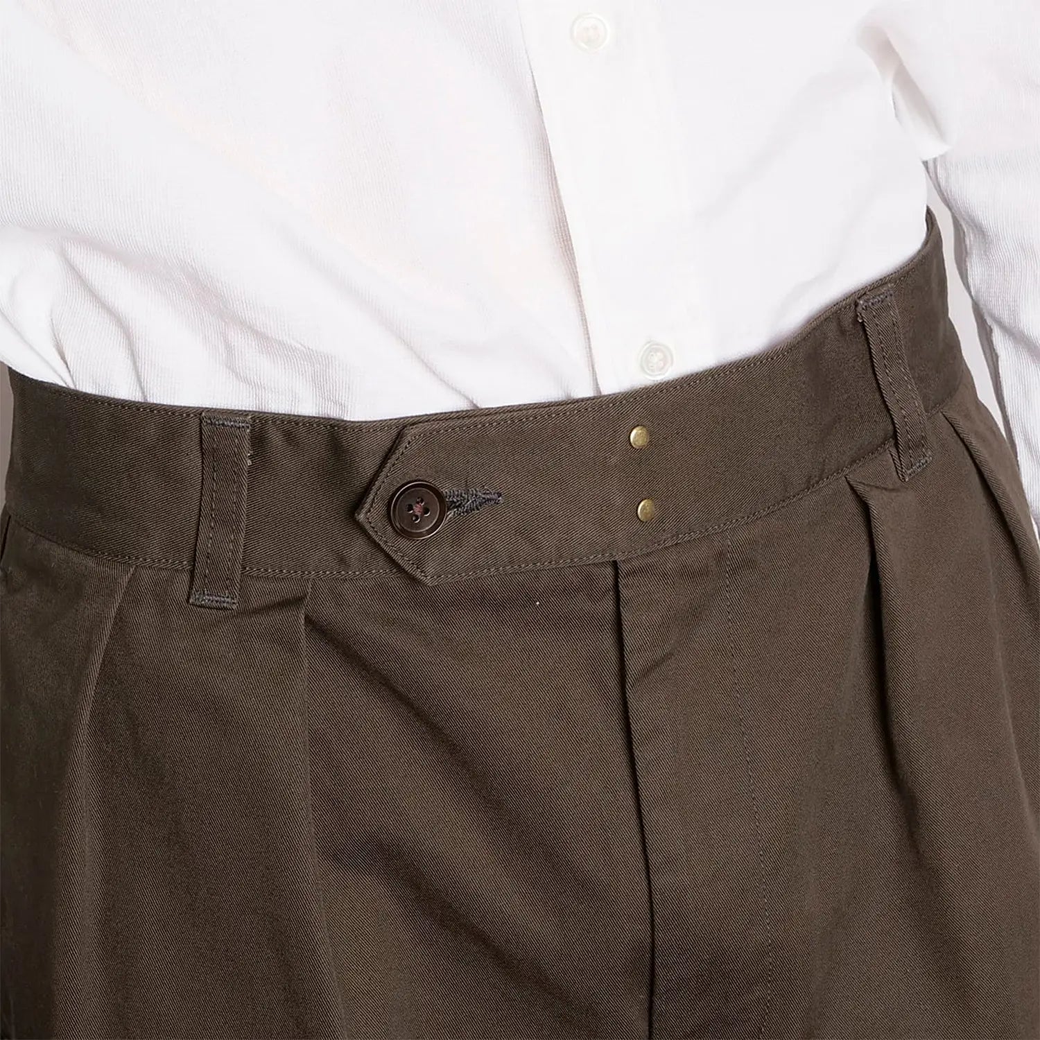 Back view of the Soundman Clarke trousers in army green showing the structured fit and back pocket detail.