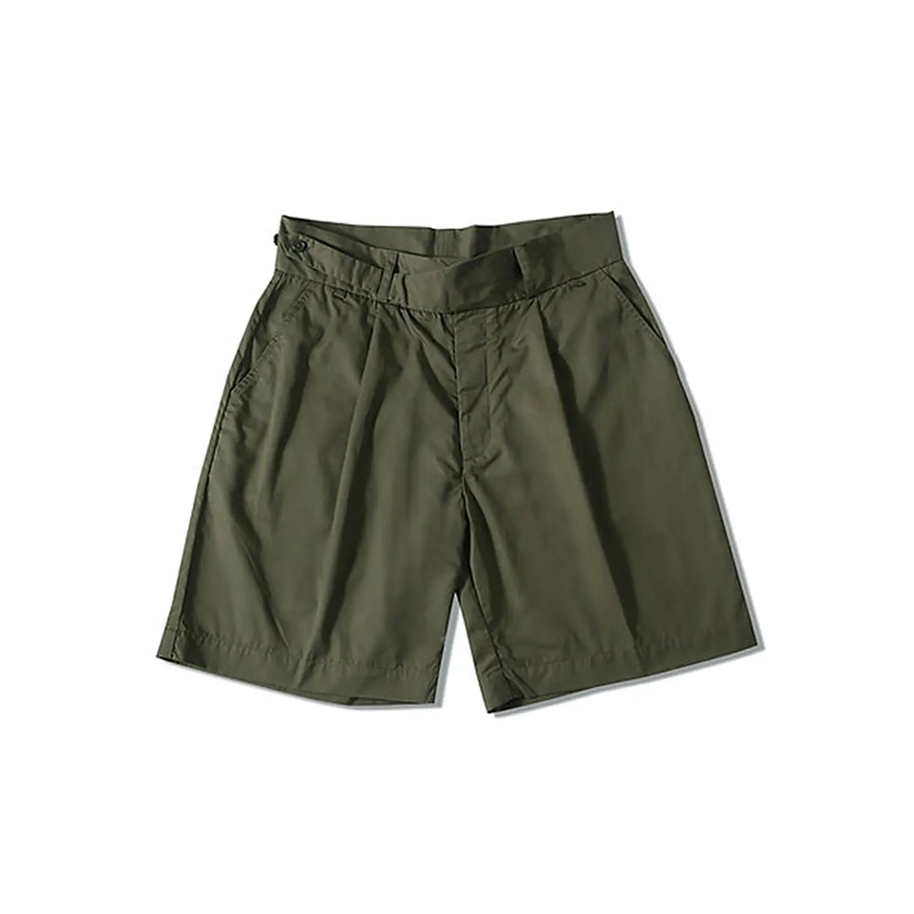 Front view of the Standard Types Pleated Chino Shorts Green showing the pleated front design, clean silhouette, and classic green tone for Clothier & Sons.