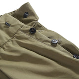 Waist detail of the Standard Types Pleated Chino Shorts Khaki showing waistband construction, belt loops, and fastening detail for Clothier & Sons.
