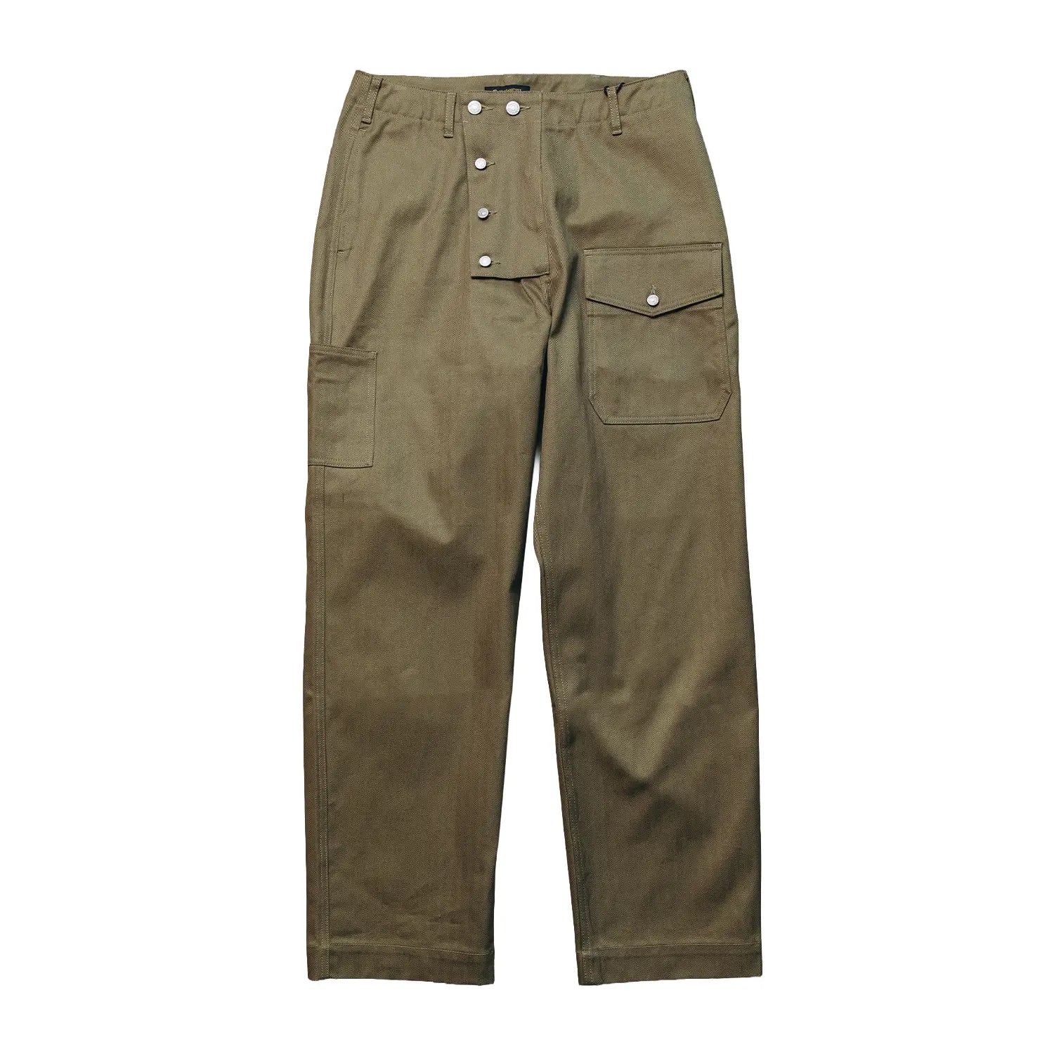 Front view of the StandardTypes ST009 Tanker Trousers HBT Green showing the relaxed military-inspired silhouette, pleated front, and herringbone twill fabric for Clothier & Sons.
