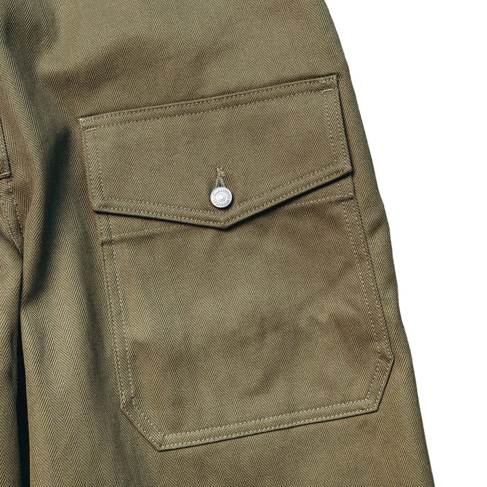 Pocket detail of the StandardTypes ST009 Tanker Trousers HBT Green highlighting utility pocket construction and reinforced stitching for Clothier & Sons.