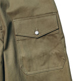 Pocket detail of the StandardTypes ST009 Tanker Trousers HBT Green highlighting utility pocket construction and reinforced stitching for Clothier & Sons.