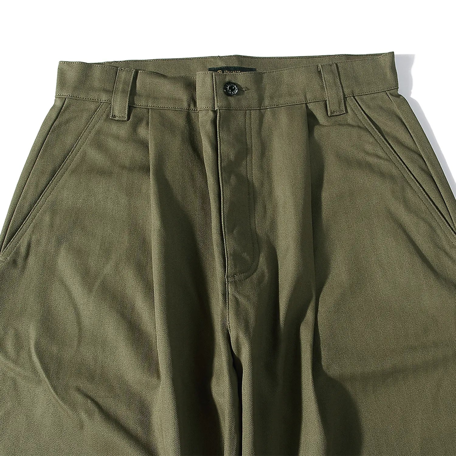 Pocket detail of the StandardTypes ST040 Naval Trousers HBT Green highlighting side pocket construction and reinforced stitching for Clothier & Sons.

