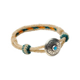 Front view of the Turquoise Concho Bracelet showing the leather band, turquoise concho centerpiece, and handcrafted artisanal finish for Clothier & Sons.