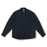 Front view of the Unaffected Drawstring Shirt Black showing the relaxed shirt silhouette, clean black tone, and adjustable drawstring hem for Clothier & Sons.
