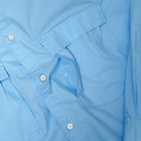 Drawstring detail of the Unaffected Drawstring Shirt Blue highlighting the adjustable hem cord, hardware detail, and functional design element for Clothier & Sons.