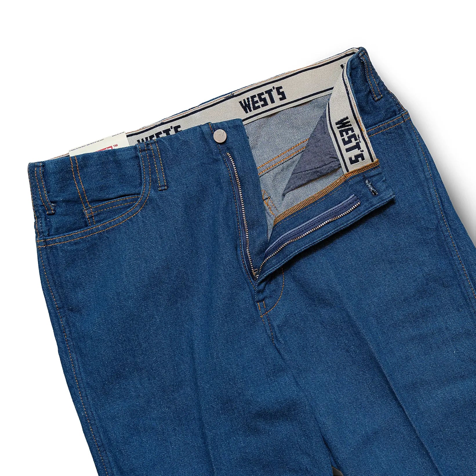 Waistband detail of the Westoverall West’s 846f Flared Denim Pants West Blue showing belt loops, button closure, and clean stitching for Clothier & Sons.