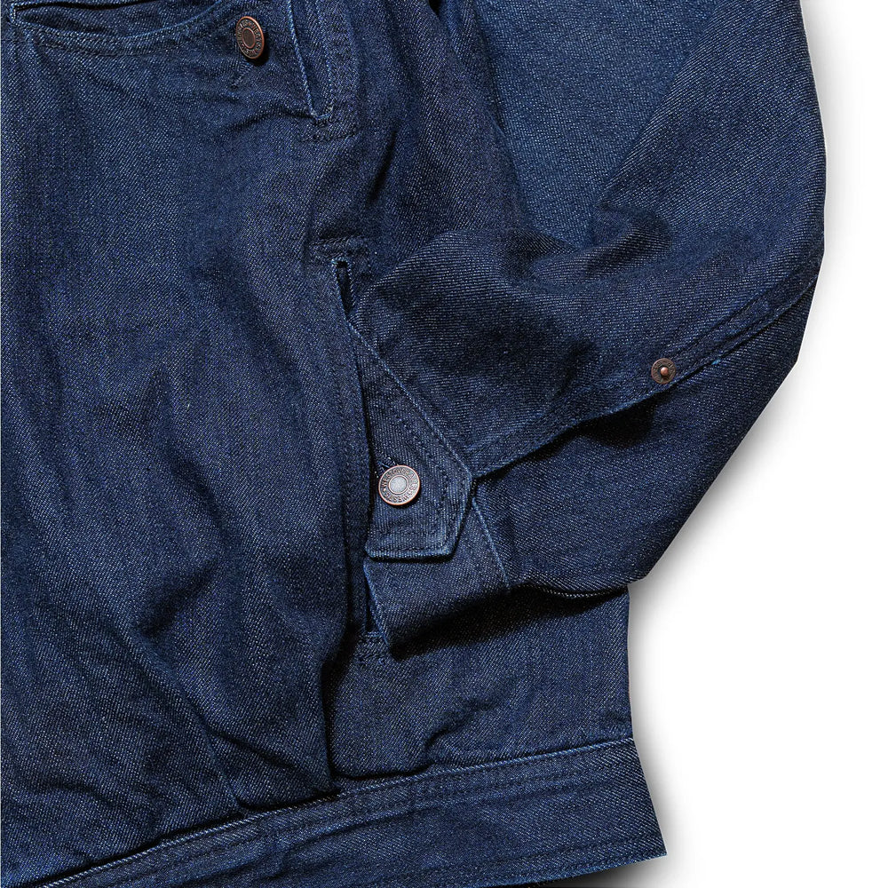 Fabric detail of the Westoverall Woch Jacket 906g Indigo revealing the dense weave, textured surface, and rich indigo character of the 906g fabric for Clothier & Sons.