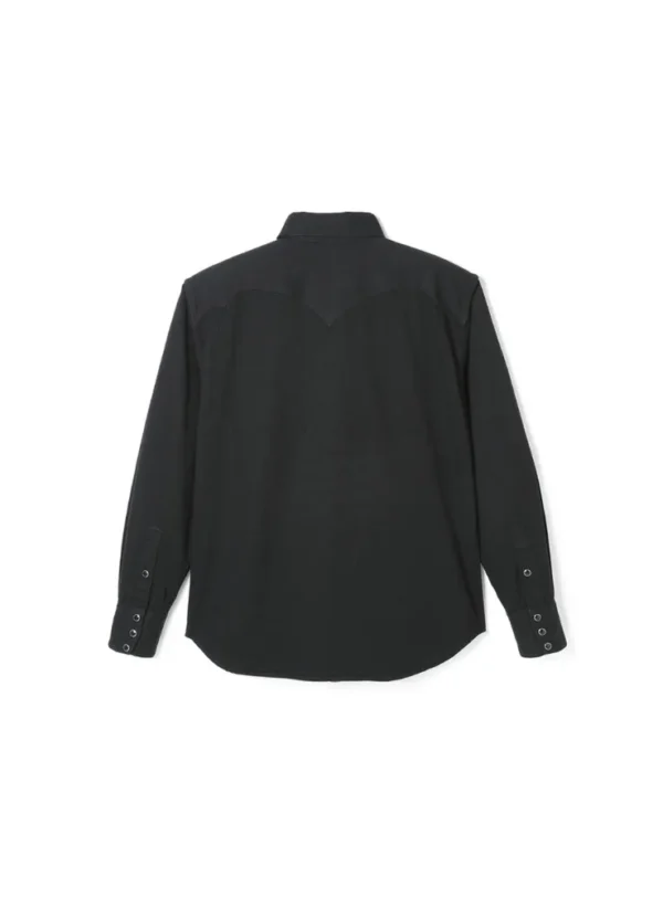 Cody western shirt with relaxed fit, featuring front yoke and wing-shaped back yoke. Made from 7.5oz black Zimbabwe cotton denim with soft yet structured texture.