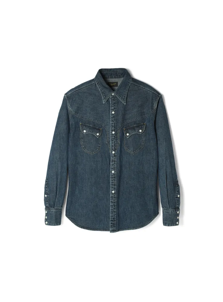 Updated Cody western shirt with relaxed fit through body, shoulders, and neck. Features front yoke and wing-shaped back yoke inspired by buffalo horn. Made from 8oz Zimbabwe cotton denim with visible slub texture.