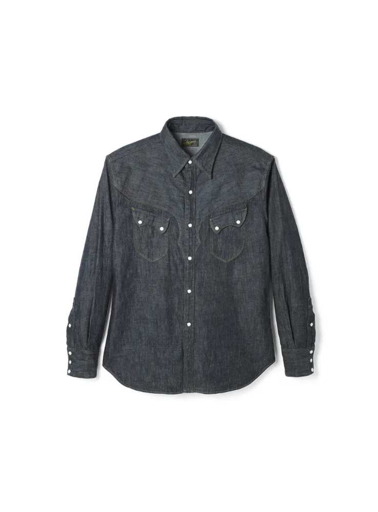 Updated Cody western shirt with relaxed fit through body, shoulders, and neck. Features front yoke and wing-shaped back yoke inspired by buffalo horn. Made from 8oz Zimbabwe cotton denim with visible slub texture.
